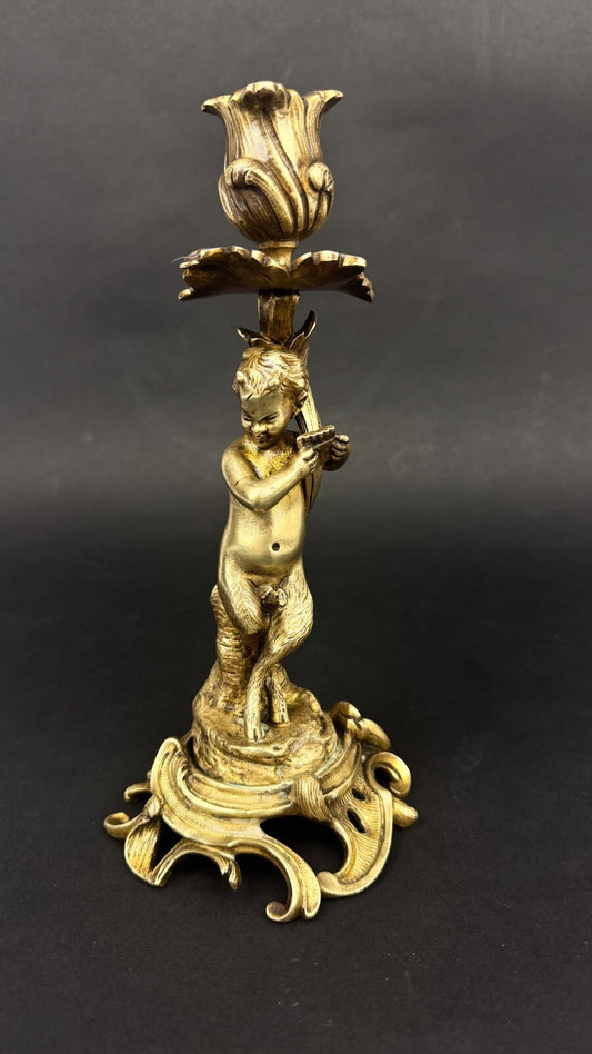 Paire de bougeoirs en bronze doré, putti, faune XIXème siècle