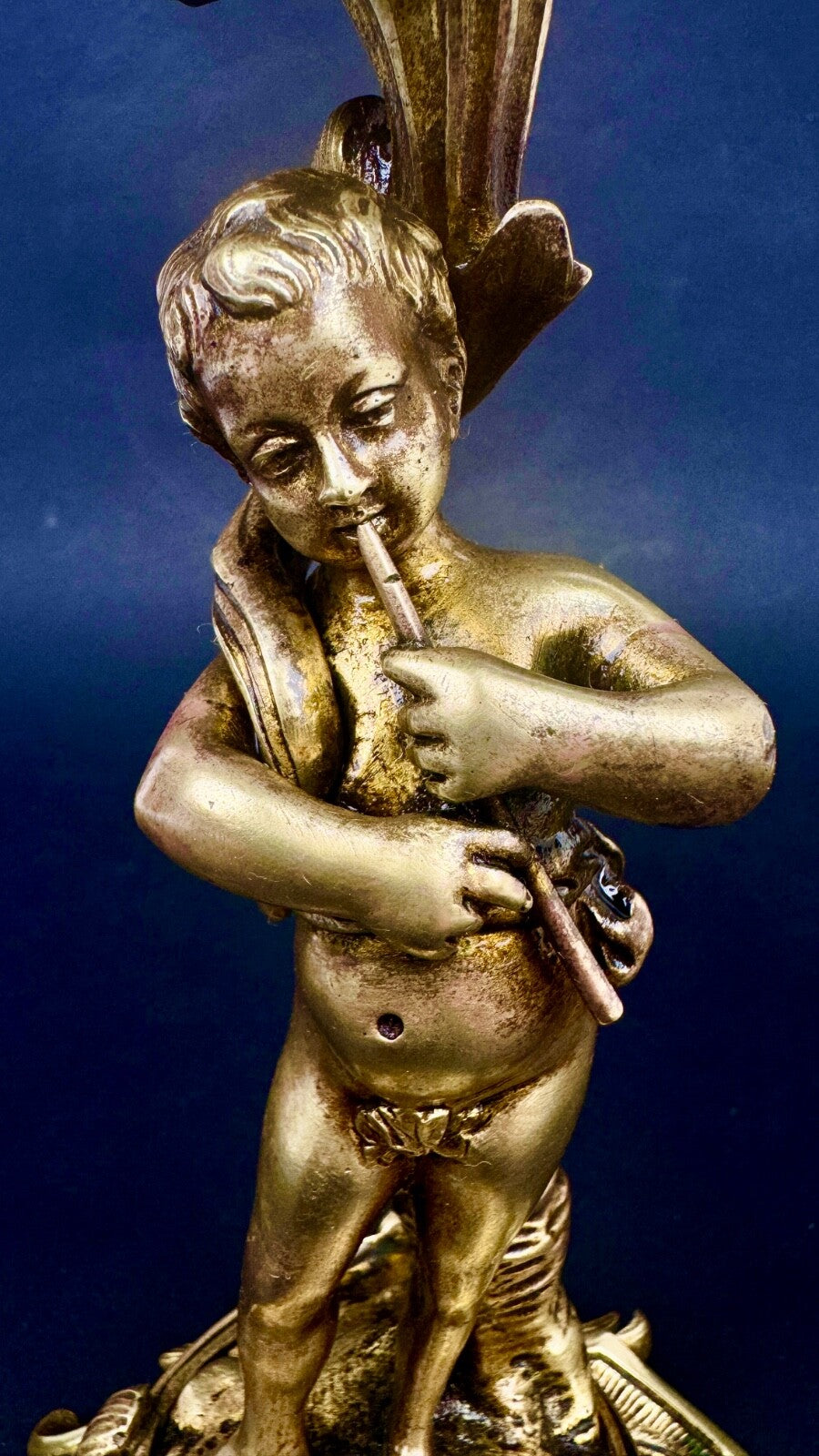 Paire de bougeoirs en bronze doré, putti, faune XIXème siècle