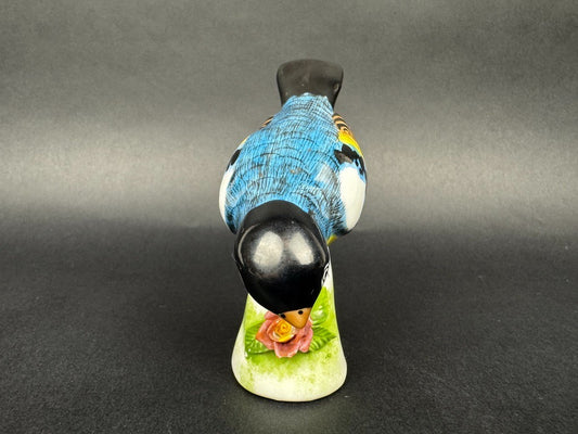 Figurine porcelaine oiseau polychrome sur socle fleuri 1950s