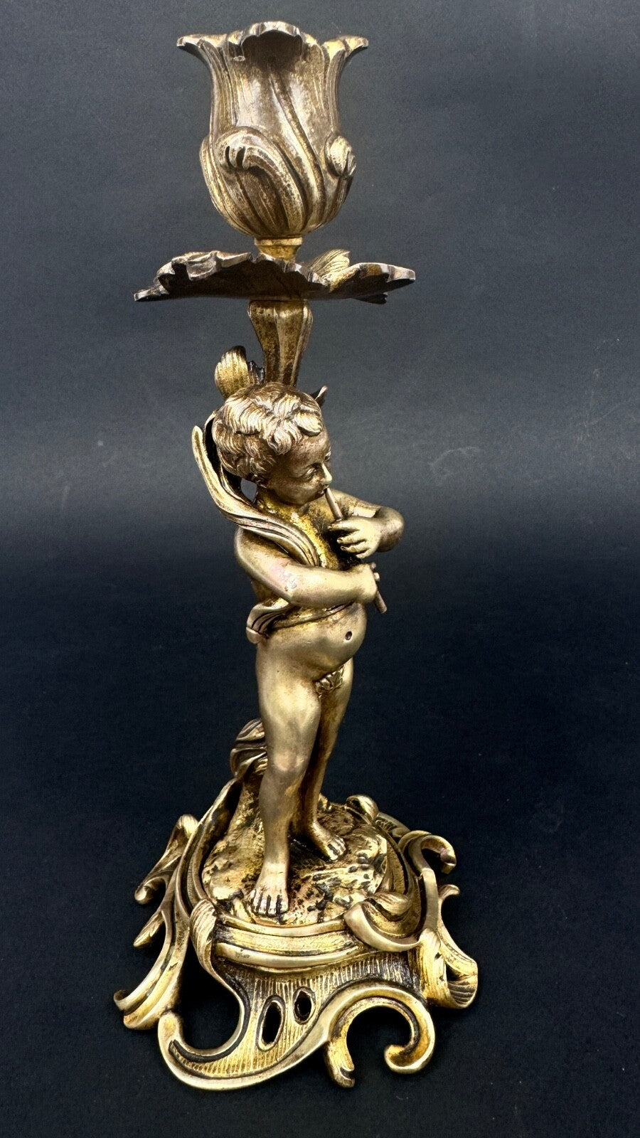 Paire de bougeoirs en bronze doré, putti, faune XIXème siècle