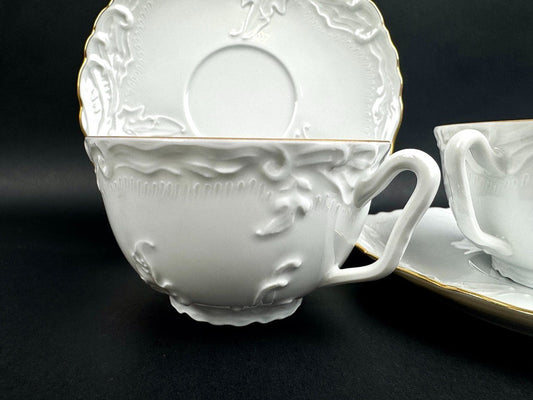 Tasses et soucoupes Tharaud Limoges porcelaine blanche relief doré