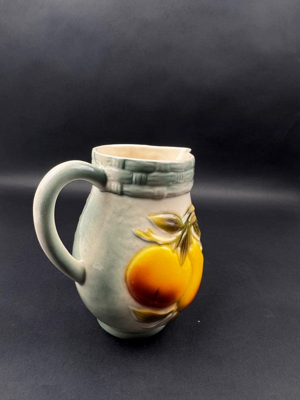 Pichet en céramique Saint-Clément décor de poires en relief