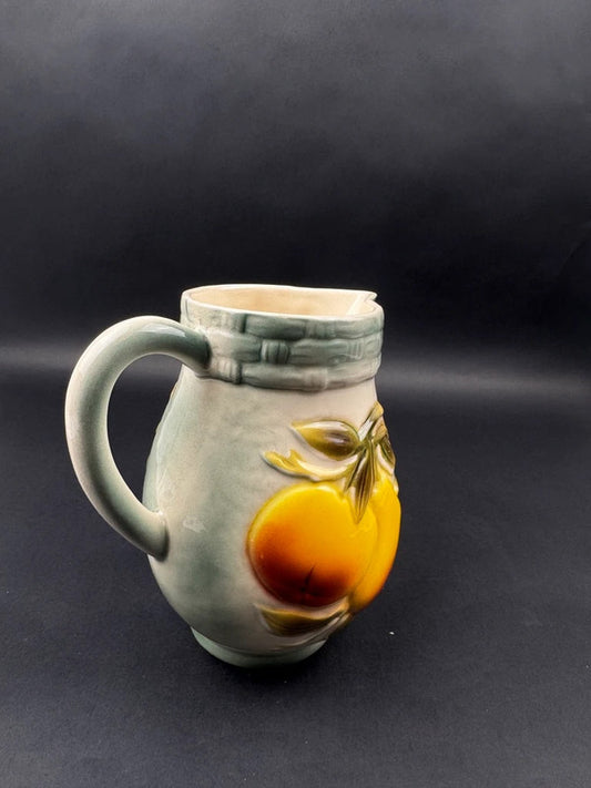 Pichet en céramique Saint-Clément décor de poires en relief