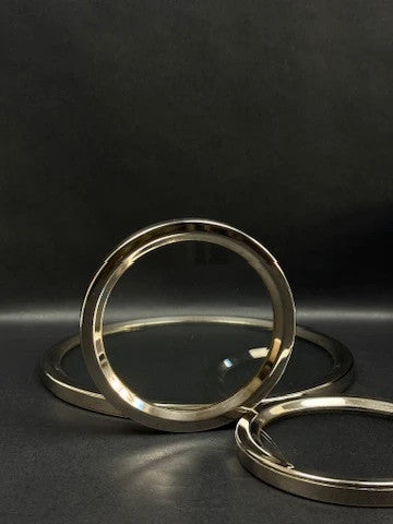 Lot de dessous de bouteille et dessous de plat vintage en chrome et verre