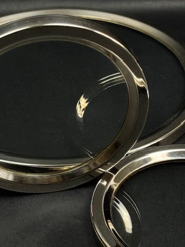 Lot de dessous de bouteille et dessous de plat vintage en chrome et verre