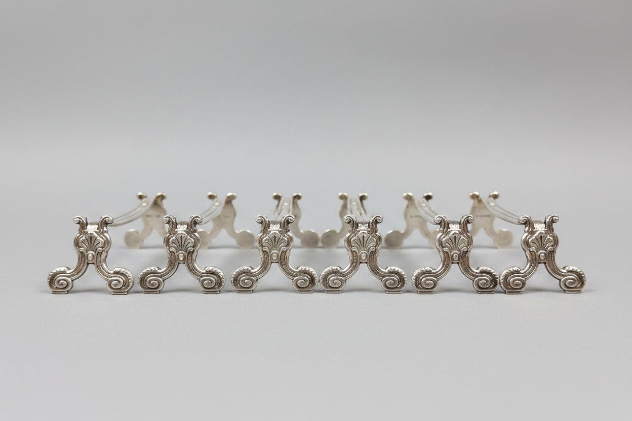 Christofle, suite de 6 porte-couteaux modèle coquille