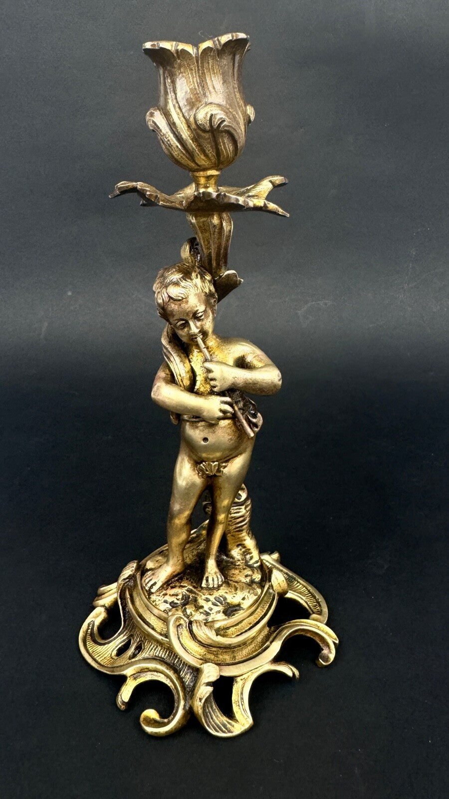 Paire de bougeoirs en bronze doré, putti, faune XIXème siècle