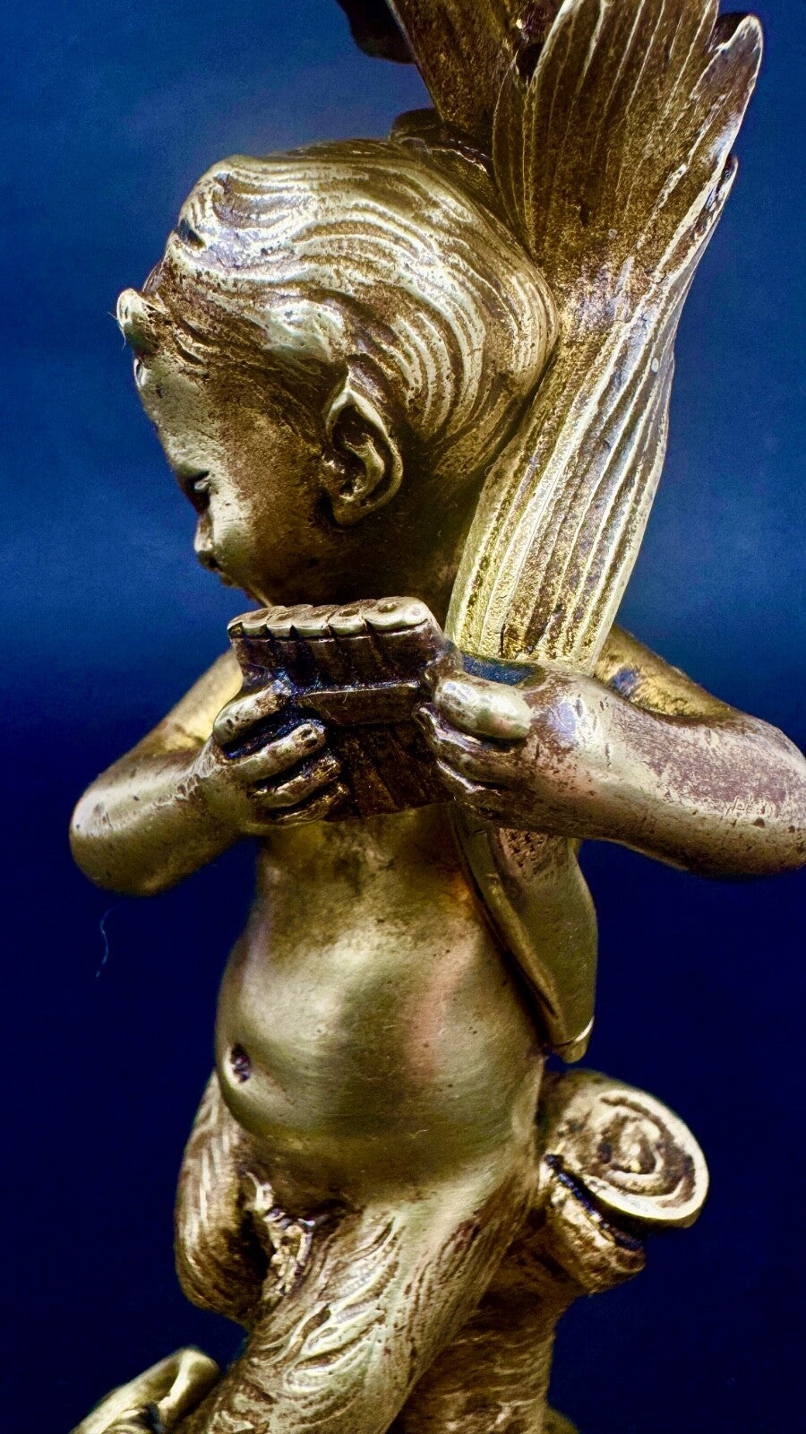 Paire de bougeoirs en bronze doré, putti, faune XIXème siècle
