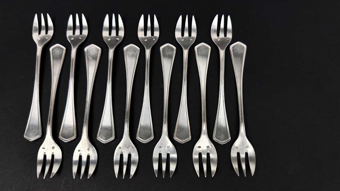 Série de 12 fourchettes à huitres art déco
