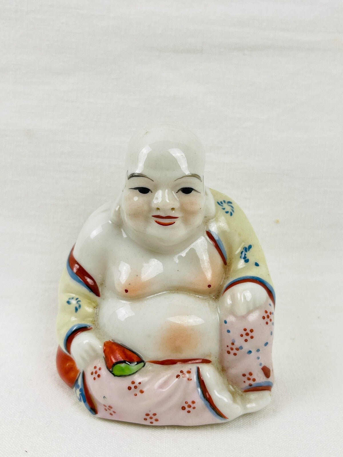 Bouddha rieur en porcelaine