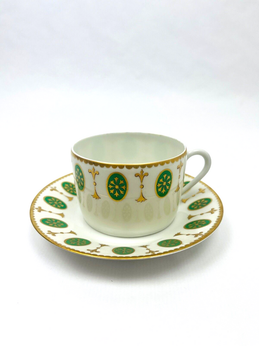 Suite de 6 tasses à thé et 1 crémier en Porcelaine de Paris décor  Louis XVI