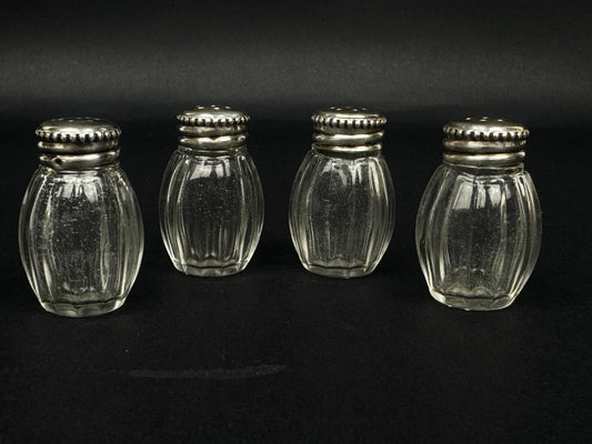 Coffret de quatre salerons Christofle en argent massif et verre