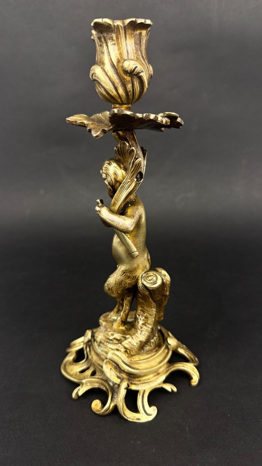 Paire de bougeoirs en bronze doré, putti, faune XIXème siècle