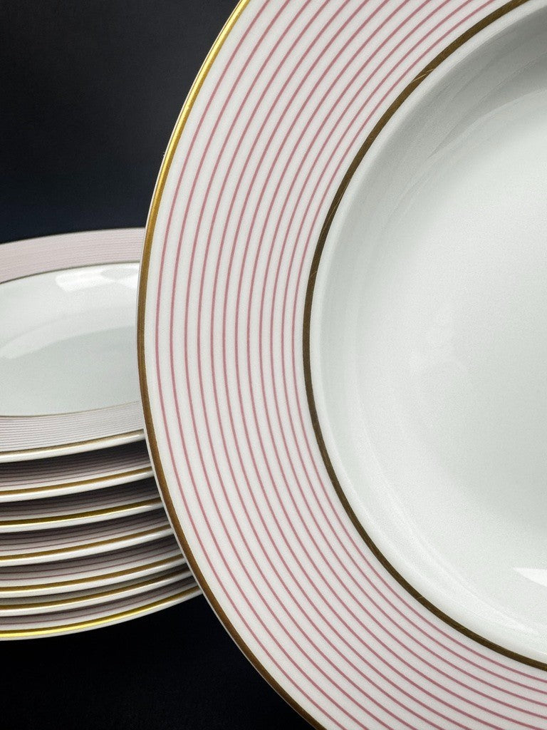 Raynaud, suite de 8 assiettes creuses en porcelaine de Limoges – Mille-Raies