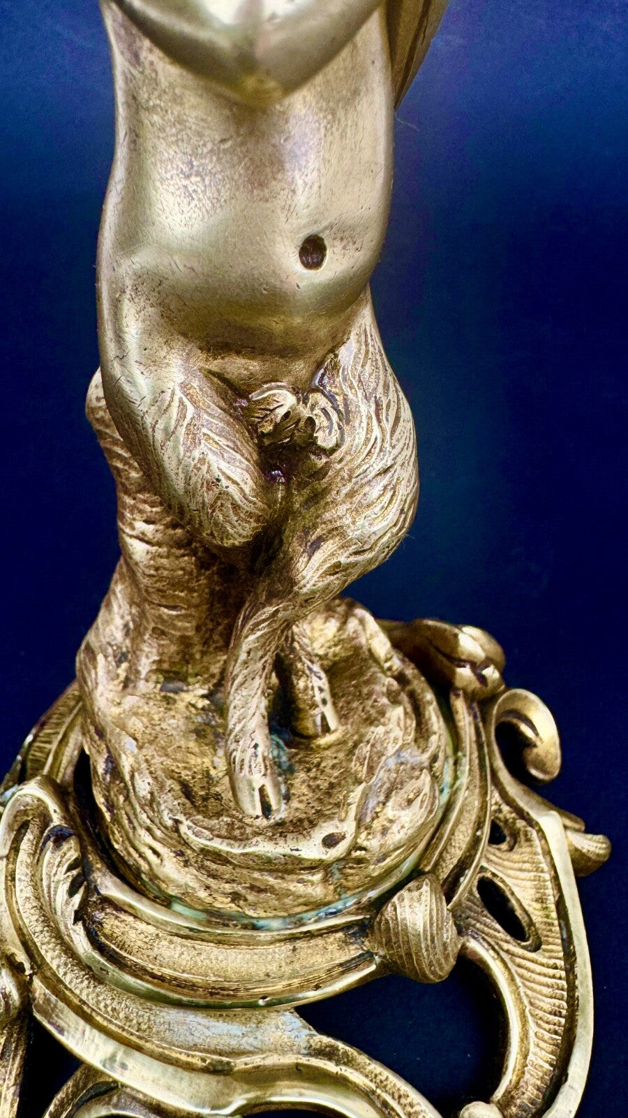 Paire de bougeoirs en bronze doré, putti, faune XIXème siècle