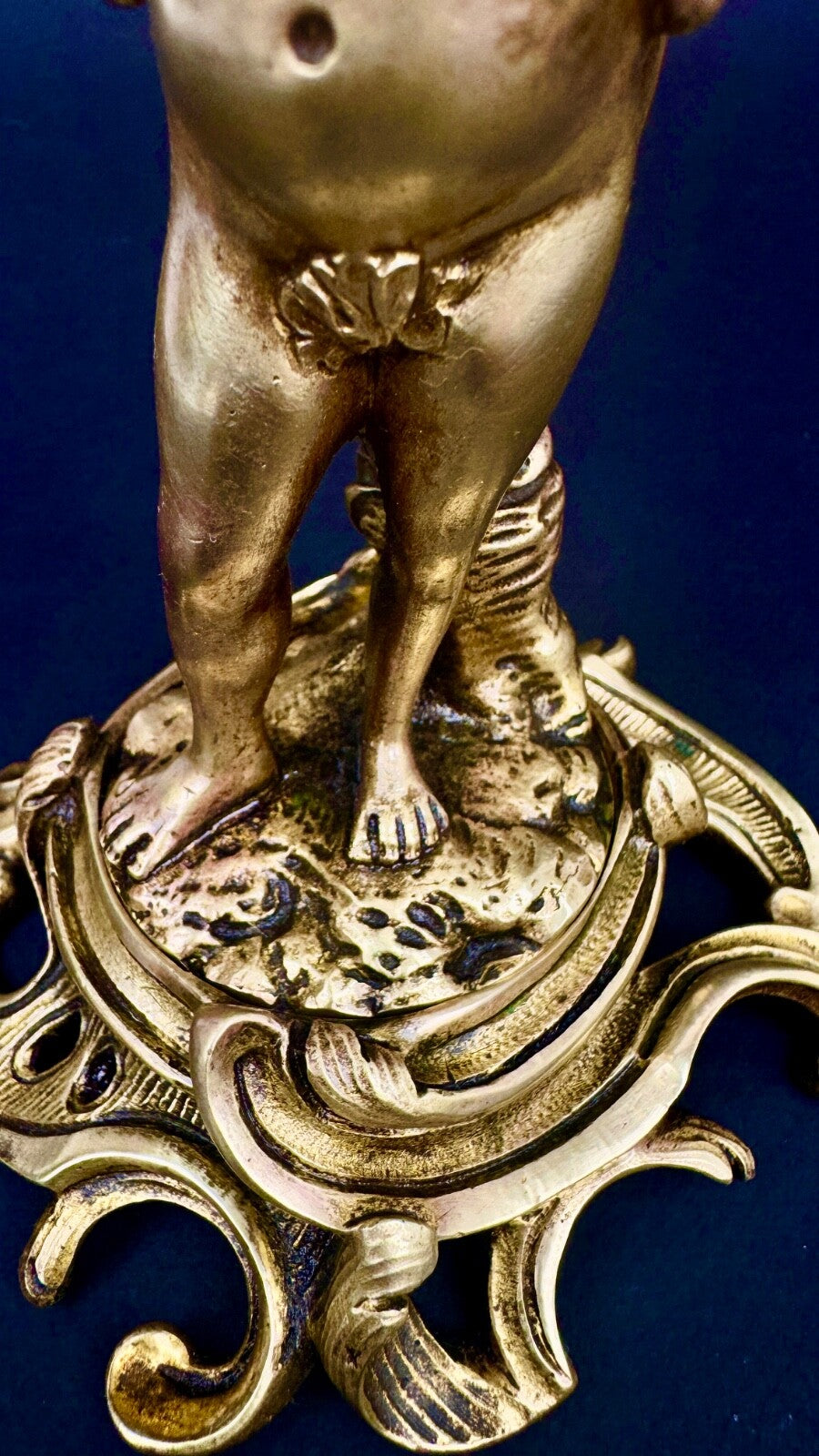 Paire de bougeoirs en bronze doré, putti, faune XIXème siècle