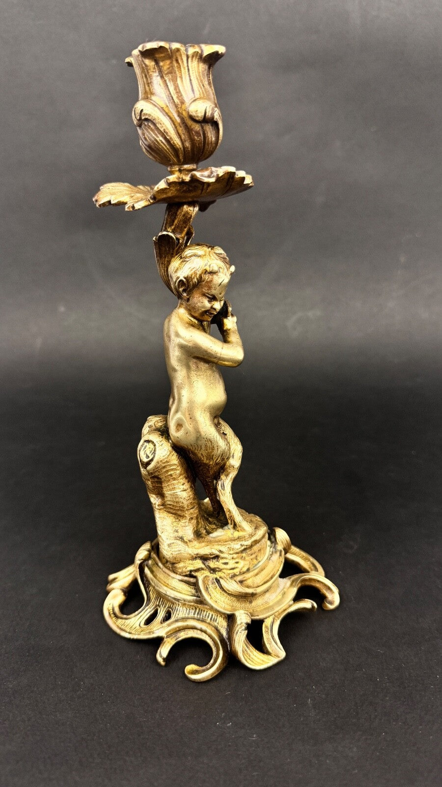Paire de bougeoirs en bronze doré, putti, faune XIXème siècle