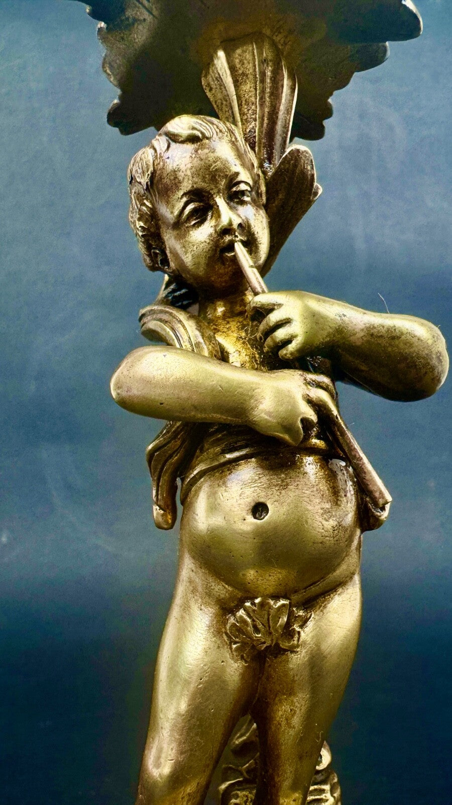 Paire de bougeoirs en bronze doré, putti, faune XIXème siècle