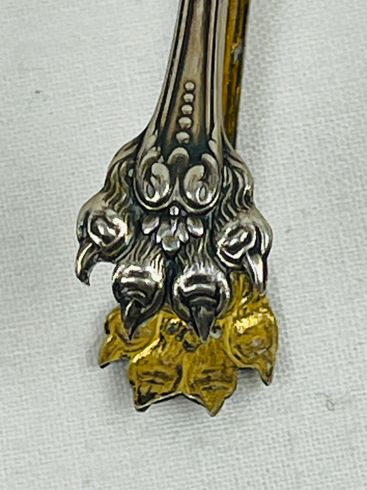 Belle pince à sucre argent massif et vermeil