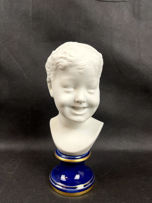 Buste d'Enfant rieur d'après Donatello en biscuit de porcelaine  Limoges