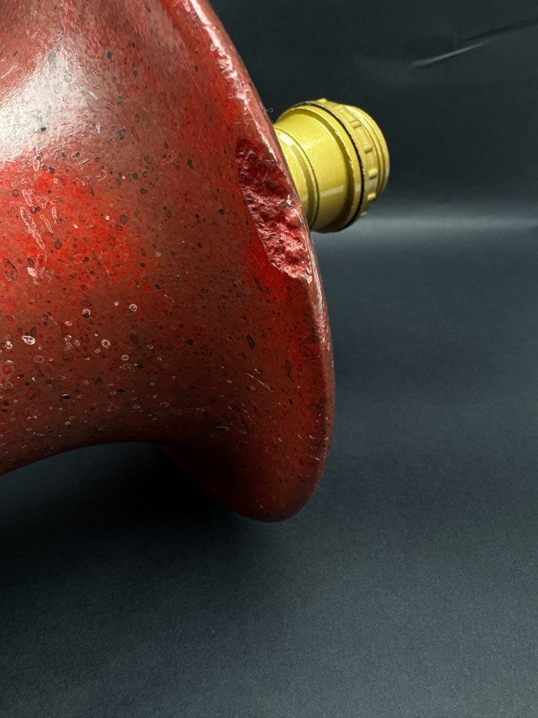 Pied de lampe en pierre reconstituée rouge "sang de bœuf", XXe siècle