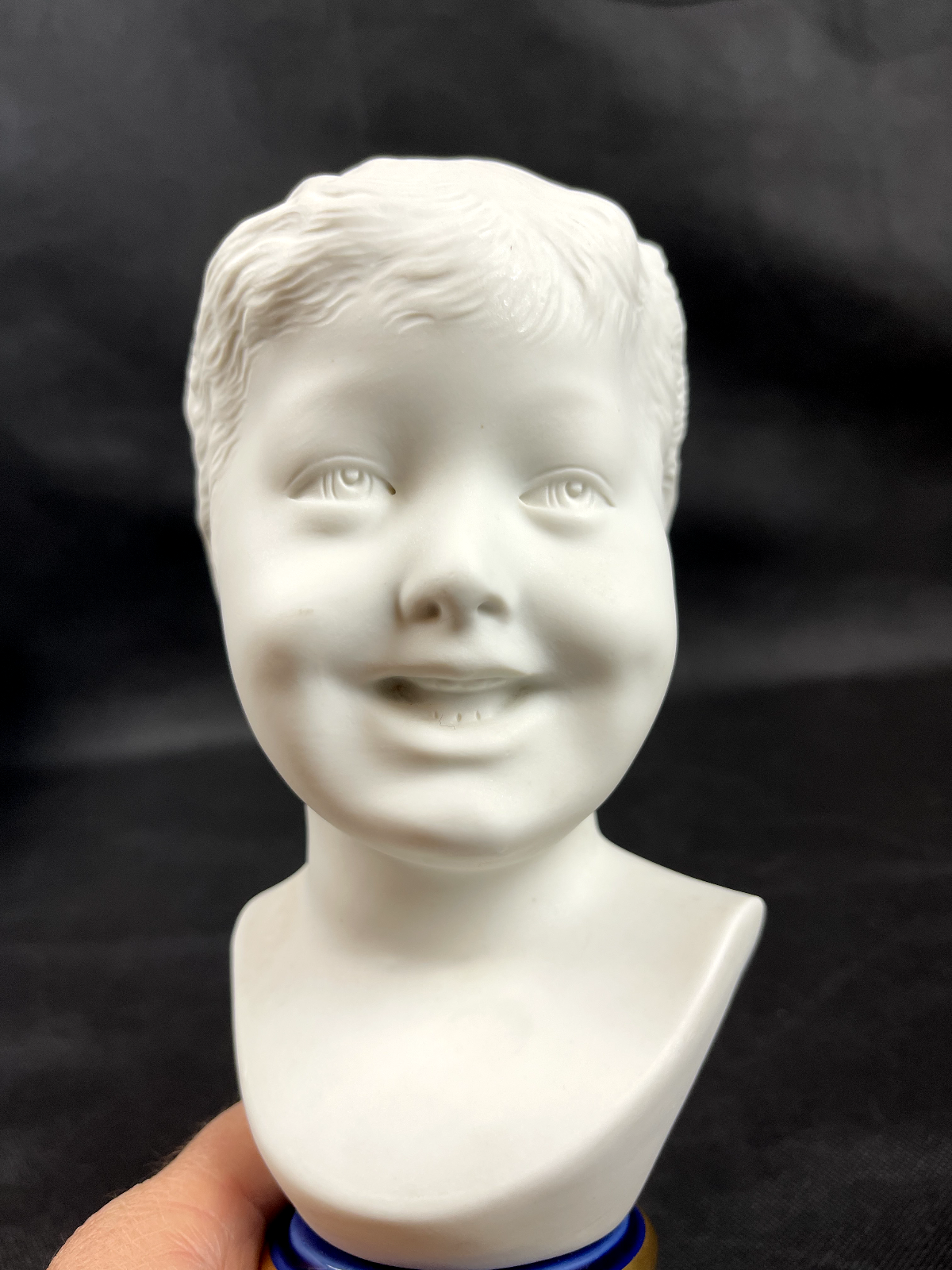 Buste d'Enfant rieur d'après Donatello en biscuit de porcelaine  Limoges