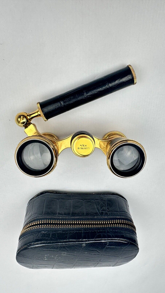 Jumelles de théâtre en cuir avec manche qui fait lampe