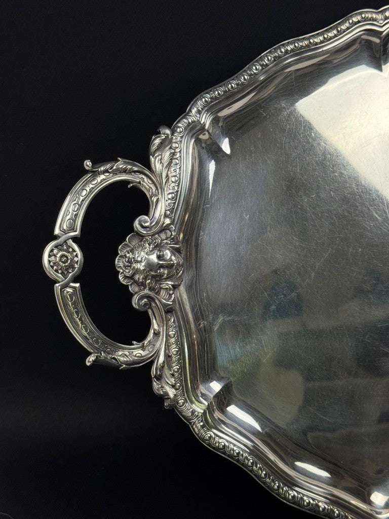Christofle, important plateau de service en métal argenté décor de mascarons