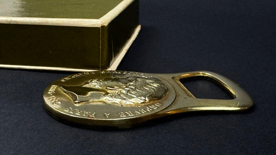 Décapsuleur Christofle métal doré à l’effigie de Charles Christofle – avec boîte d’origine