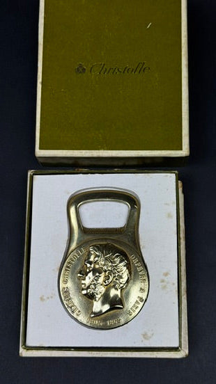 Décapsuleur Christofle métal doré à l’effigie de Charles Christofle – avec boîte d’origine