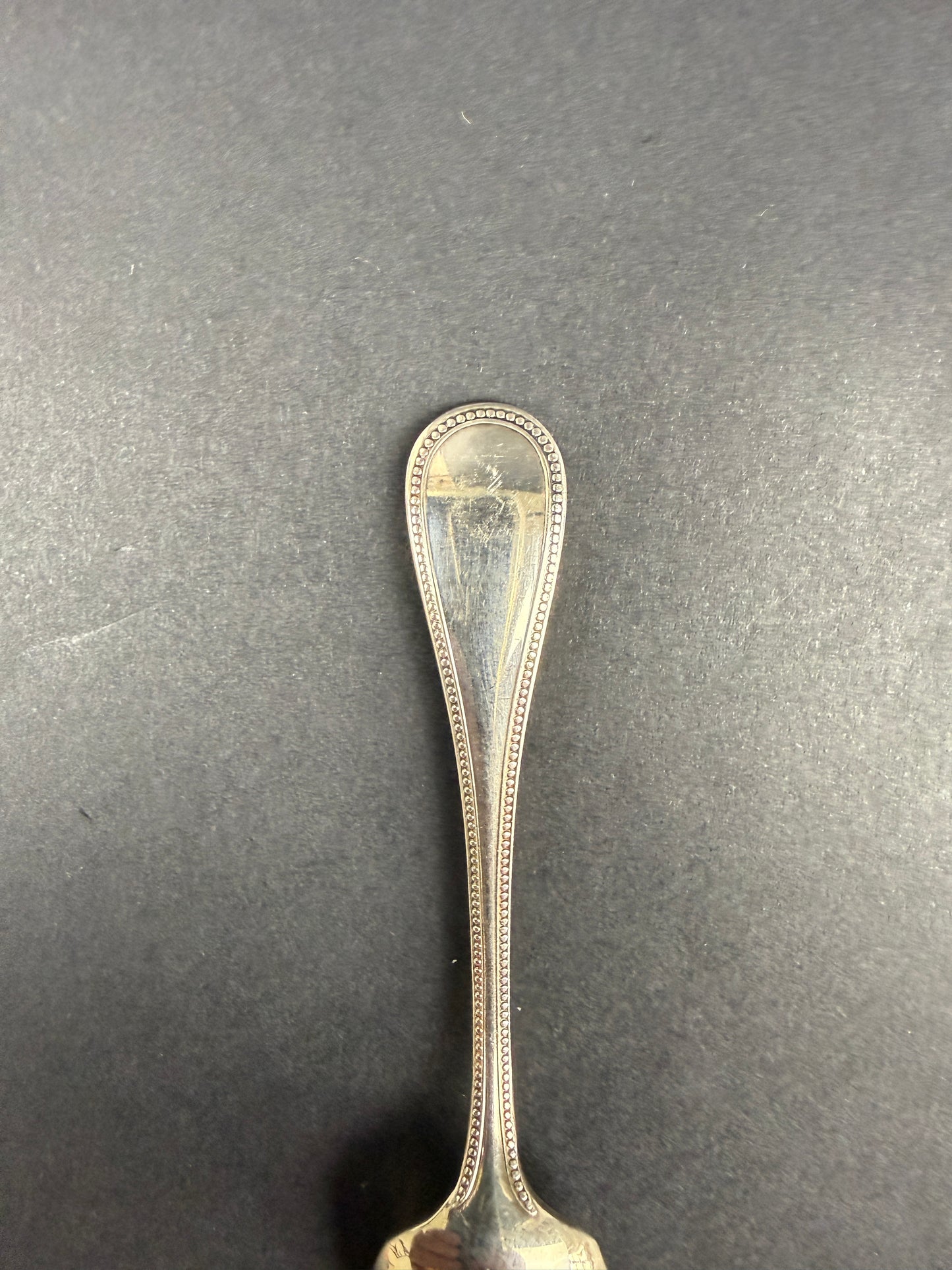 Christofle, suite de 9 cuillères à moka modèle perles