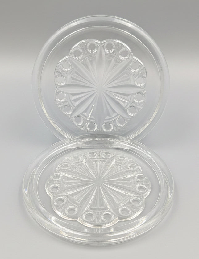 Baccarat, suite de deux dessous de bouteille